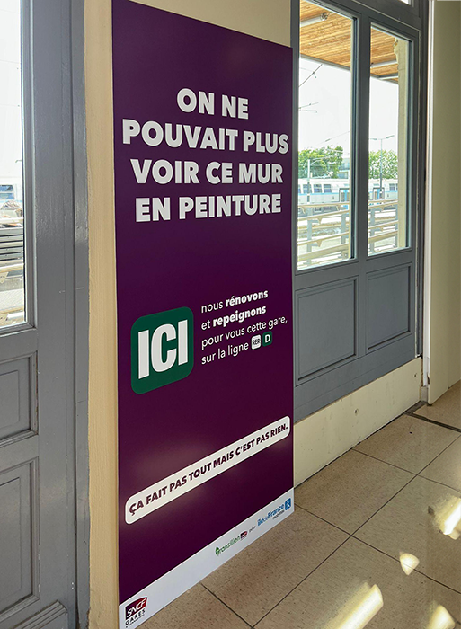 Photo d'un visuel de la campagne "Ça fait pas tout mais c’est pas rien !" où il est écrit : "On ne pouvait plus voir ce mur en peinture".